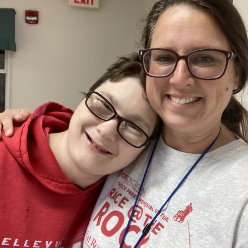 Staff member smiling with resident