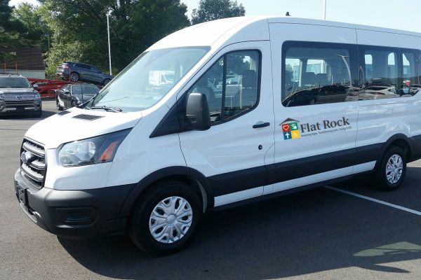 Transportation van in parking lot